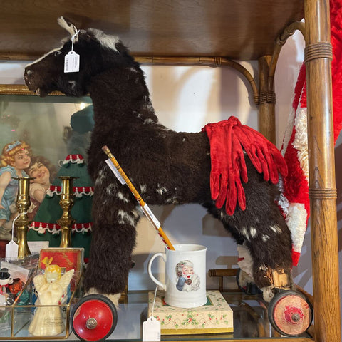 Vintage shabby fur rocking horse