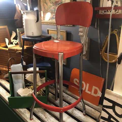 Vintage red metal chair