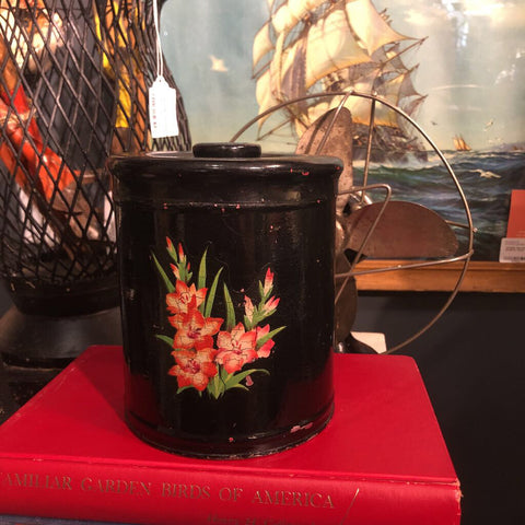 Vintage black flowered canister