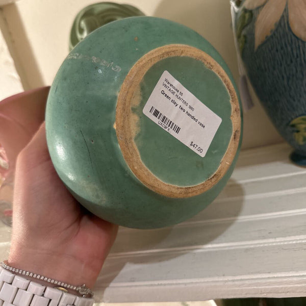 Green clay two handled vase