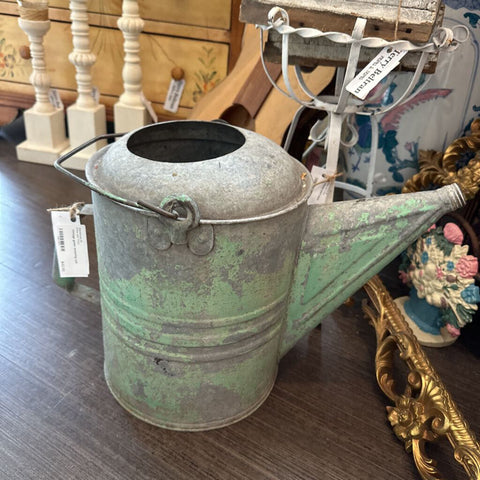 Vintage green watering can