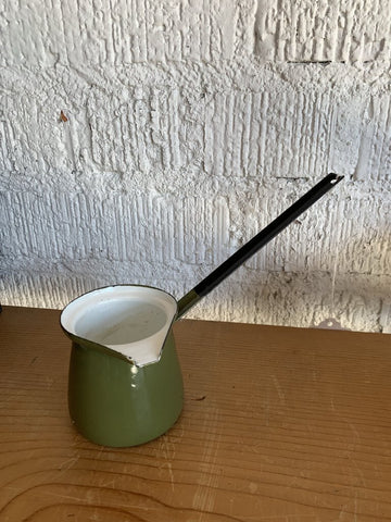 Vintage Olive Green Enamel Scoop- Rust inside- 2.75" w x 7.5" l x 2.5" t(pot) 4.25" (handle)