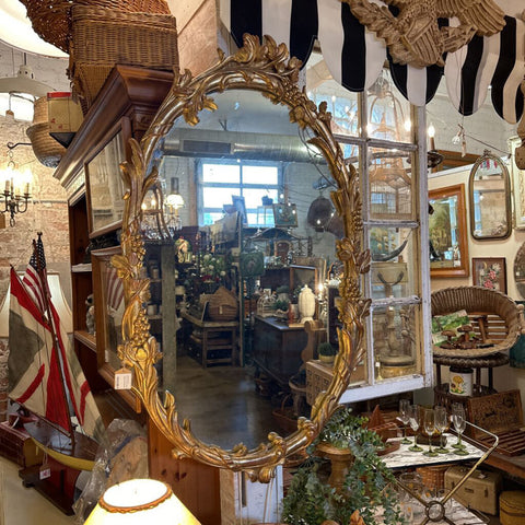 Gold oval mirror. 27x42 in-store pick up only