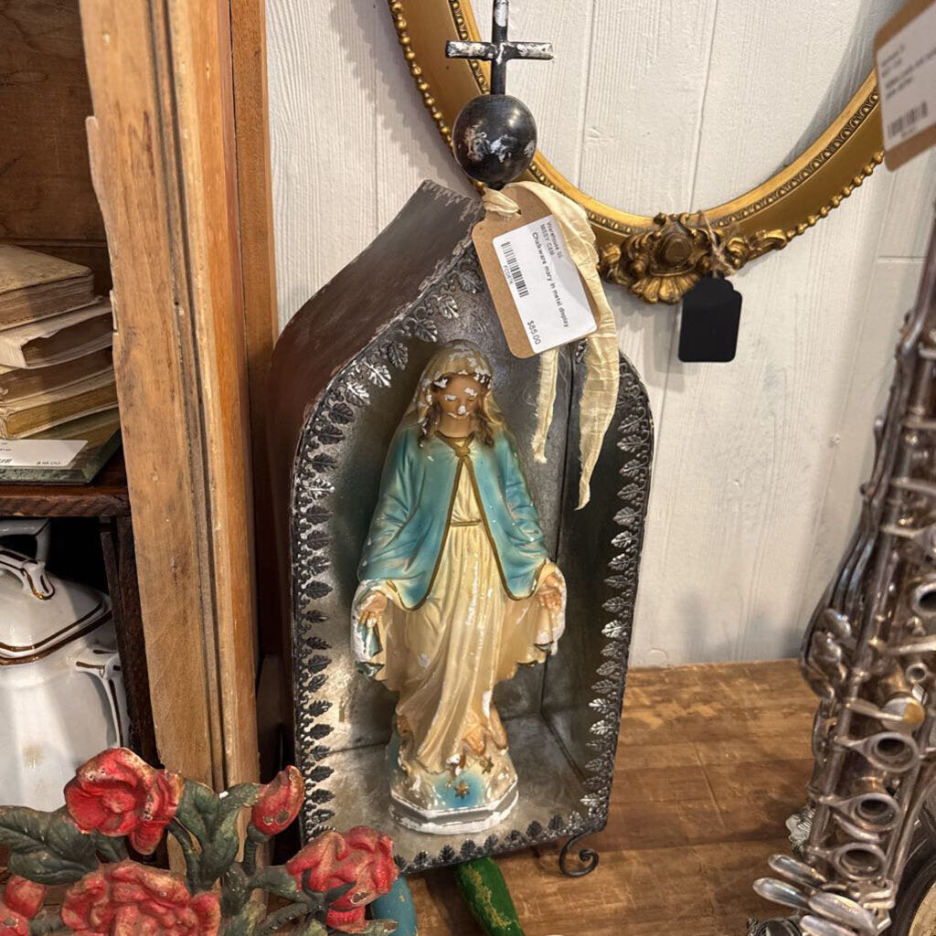 Chalkware mary in metal display