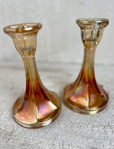 LOVELY PAIR OF MARIGOLD IRRIDESCENT CARNIVAL GLASS CANDLESTICKS. 6 1/2" x 4"