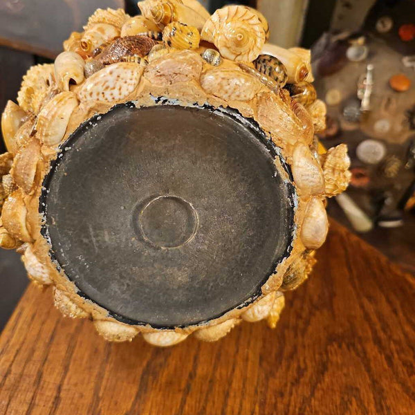 Shell memoryware on glass vase roundish