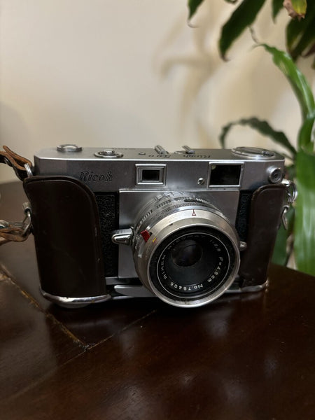 Vintage Ricoh 500 35mm with leather case 5.5x3.5in