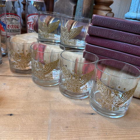 Set of 7 embossed Eagle glasses.