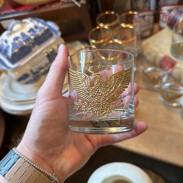 Set of 7 embossed Eagle glasses.
