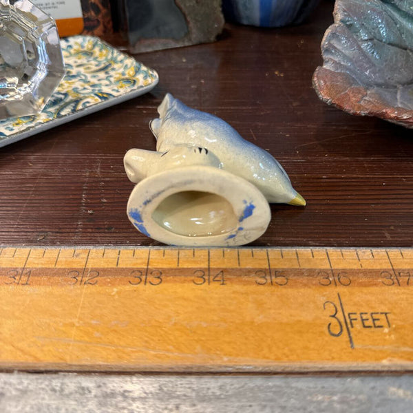 Vintage ceramic bird figurine each