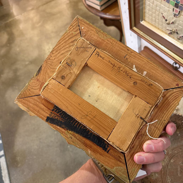 antique iron plant stand