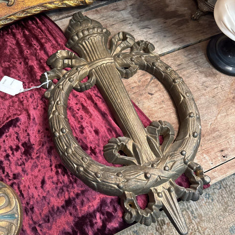 Heavy Cast metal torch wreath wall plaque