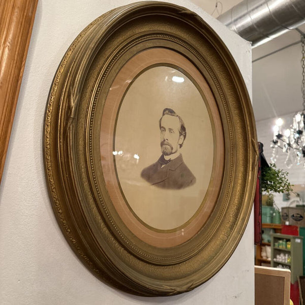 PORTRAIT IN ANTIQUE OVAL FRAME 23" x 21". IN STORE PICKUP