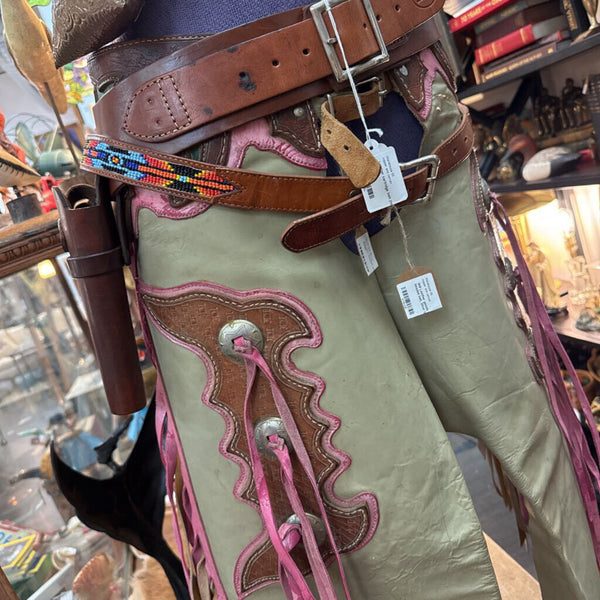 Western leather chaps with pink fringe