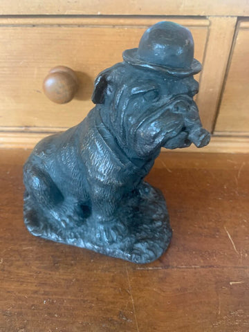 Vintage cast iron bulldog with hat smoking a cigar