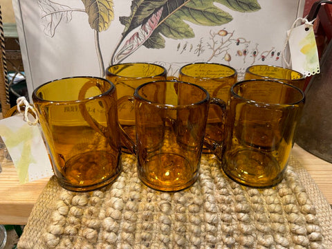 Vintage set of 6 amber blown glass mugs.