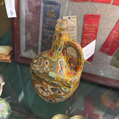 Folk art swirly painted bottle