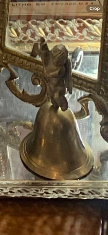 Vintage brass bell with cherub