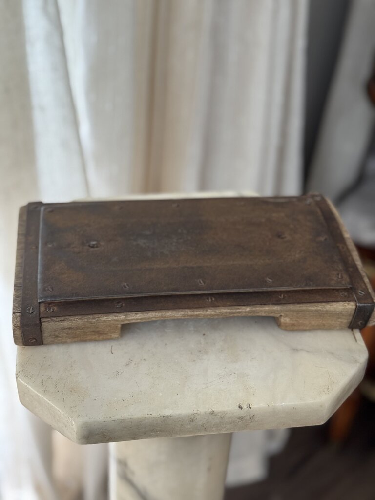 Primitive wood and metal riser
