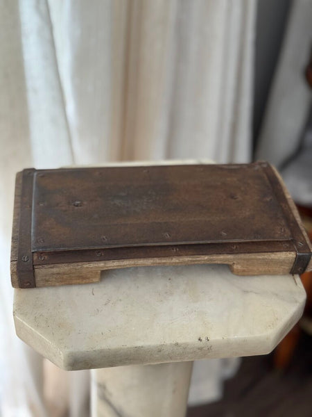 Primitive wood and metal riser