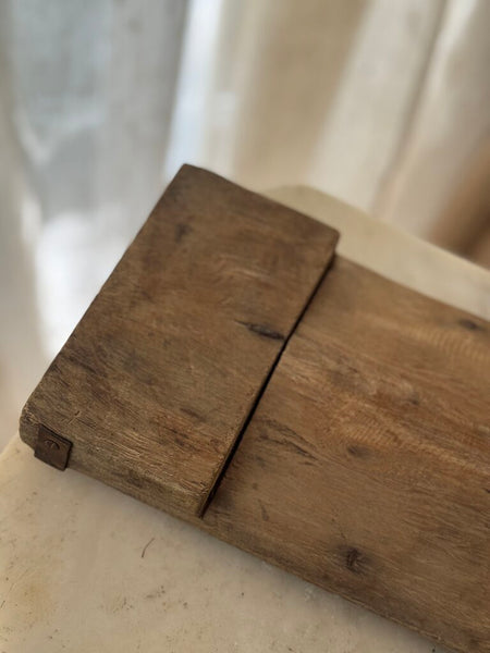 Primitive wood and metal riser