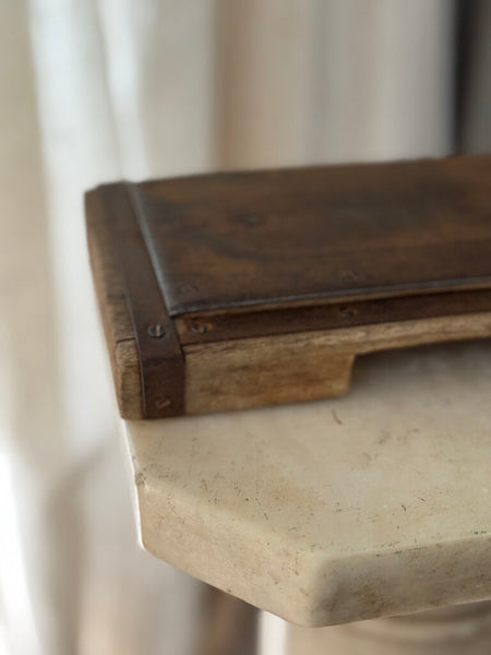 Primitive wood and metal riser