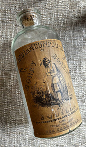 Antique Bottle With Reproduction Label