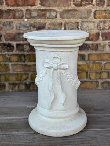 Plaster bow detail pedestal