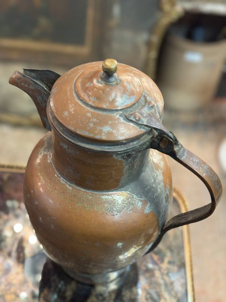Antique copper pitcher
