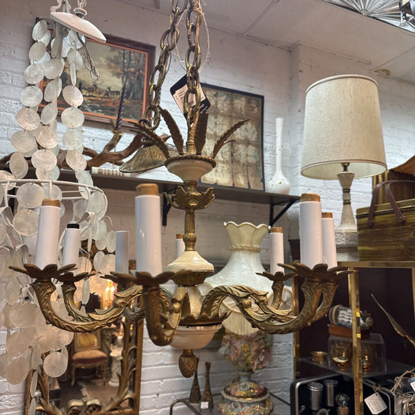 Brass and white chandelier