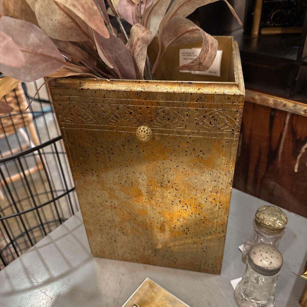 Gold wastebasket