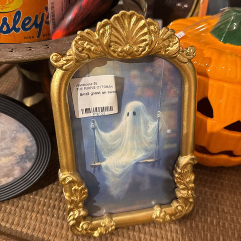 Small ghost on swing gold frame