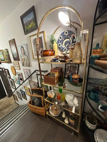 Brass and glass shelving unit in store pick up only