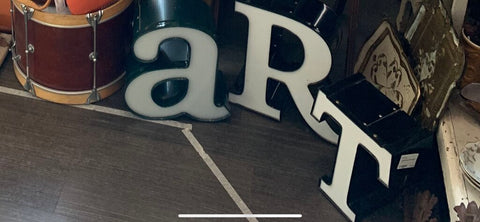 Vintage Marquee letters spelling " art"