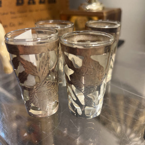 Set a four vintage Sterling silver shot glasses