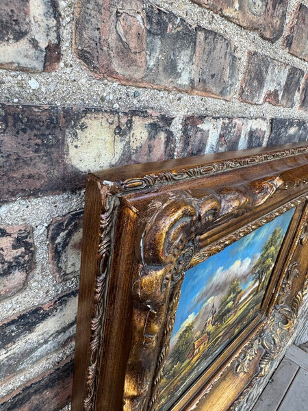 Vintage oil on board landscape in wood/plaster frame
