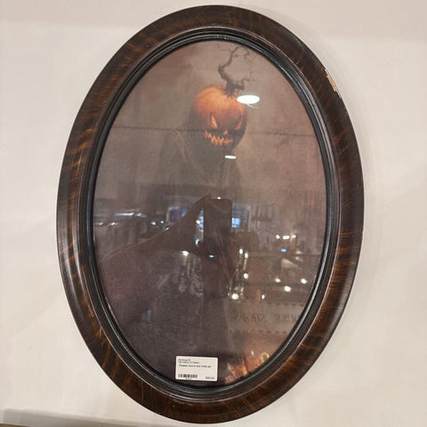 Pumpkin face in oval frame pic
