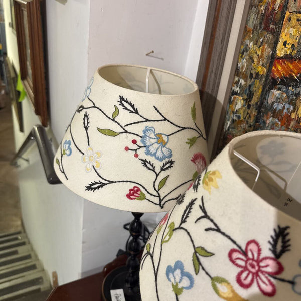 pair of black lamps with embroidered shades as is