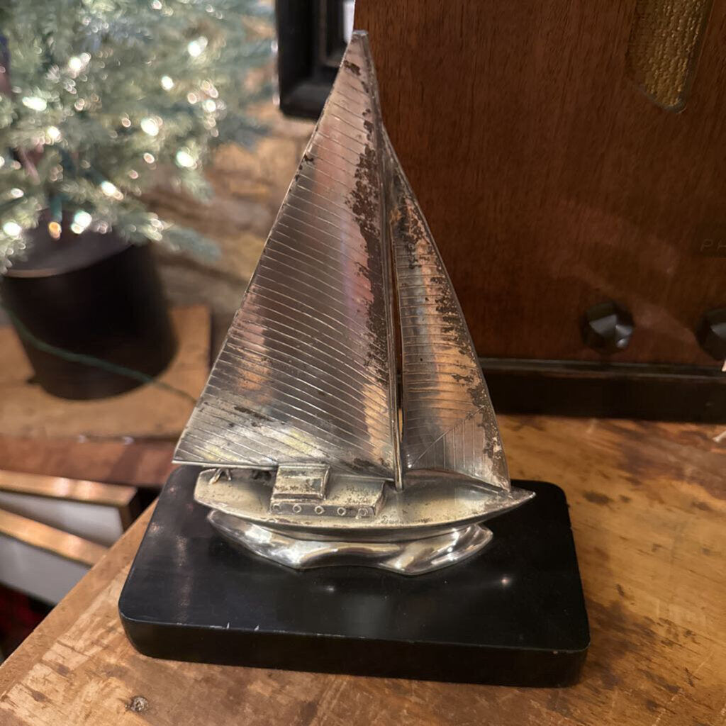 Silver Sailboat on marble