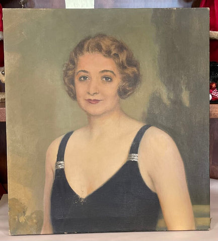 Vintage portrait of woman in black dress with rhinestones is