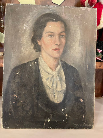 Vintage portrait of a woman with a bow on her blouse as is