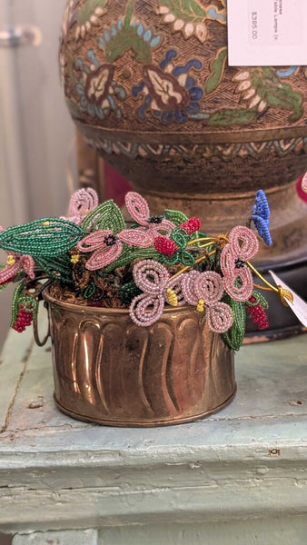 Beaded flower bouquet in brass container