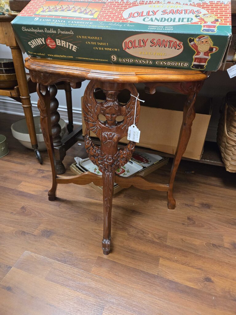 Half table with lady legs in store 33 x 23 x11 pick up only