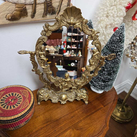 Brass cherub mirror 13 tall