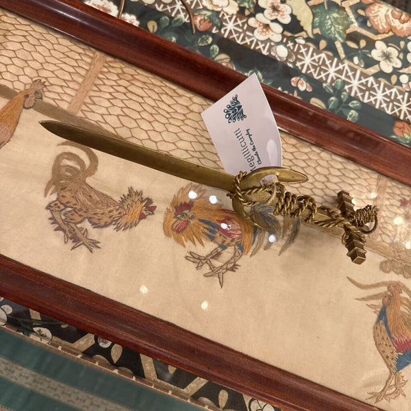 Mid-century brass letter opener with anchor and rope motif. A symbol of steadiness and the sea-crafted with sculptural detail and maritime charm.