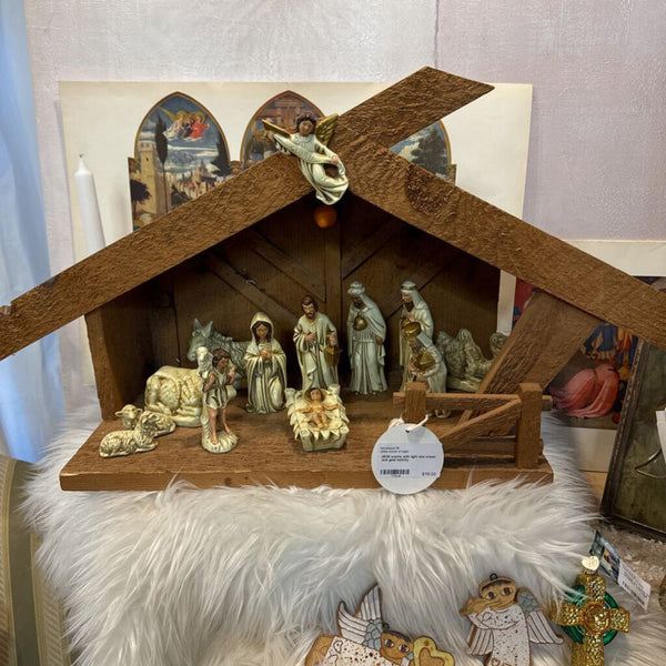 MCM creche with light and cream and gold nativity