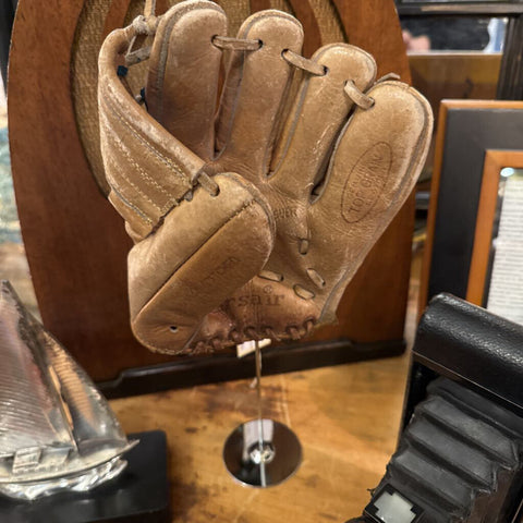 Vintage Child's BB mitt on stand