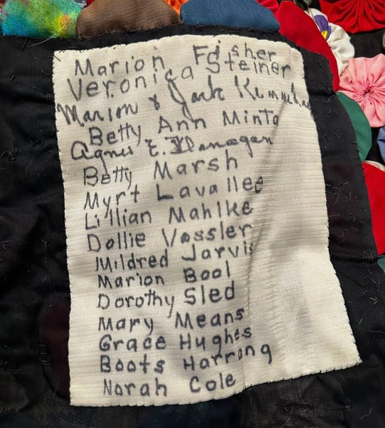 VINTAGE HANDSEWN YO-YO QUILT, PERSONALIZED PANEL ON BACK . 62" x 42"