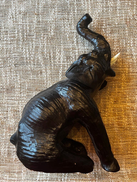 Vintage Brown Leather Wrapped Sitting Elephant With Raised Trunk