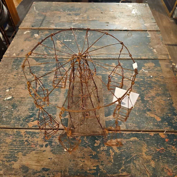 Folk art wire carnival swing